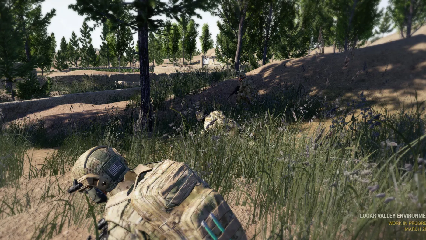 Squad rifleman crouched in cover with full kit on a sandy berm